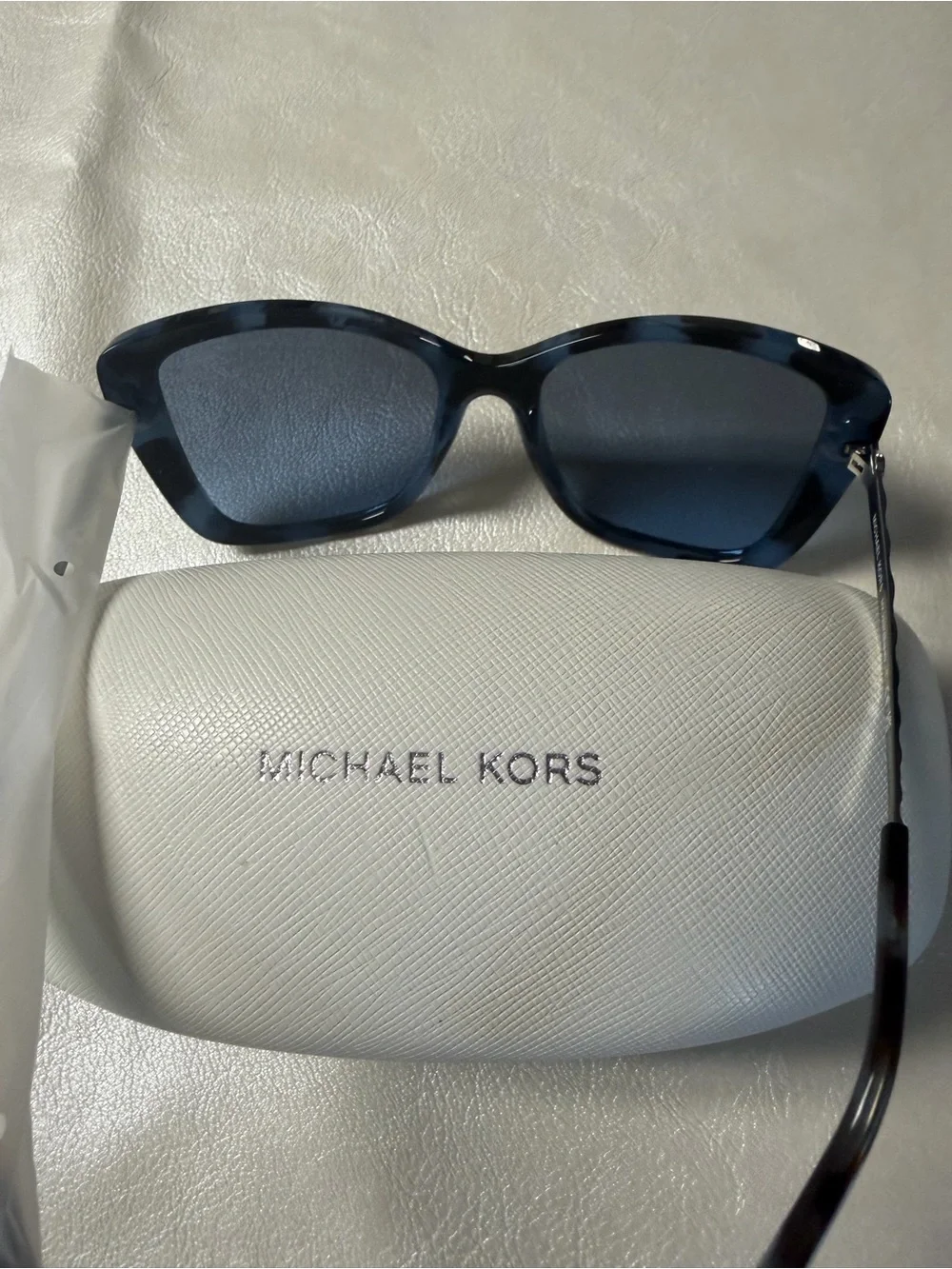Michael Kors sophisticated cat
